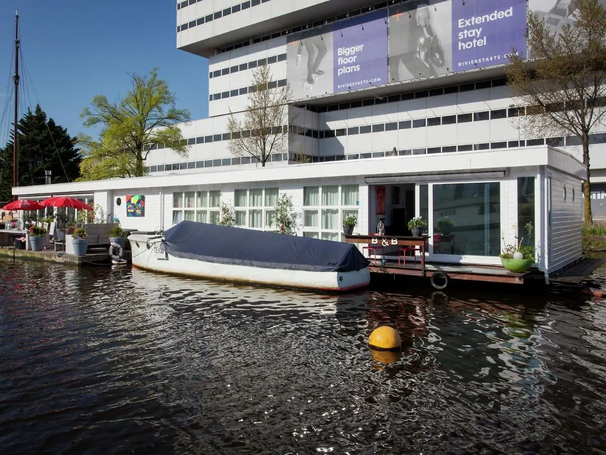 Modern Houseboat Apartment In Amsterdam With Terrace
