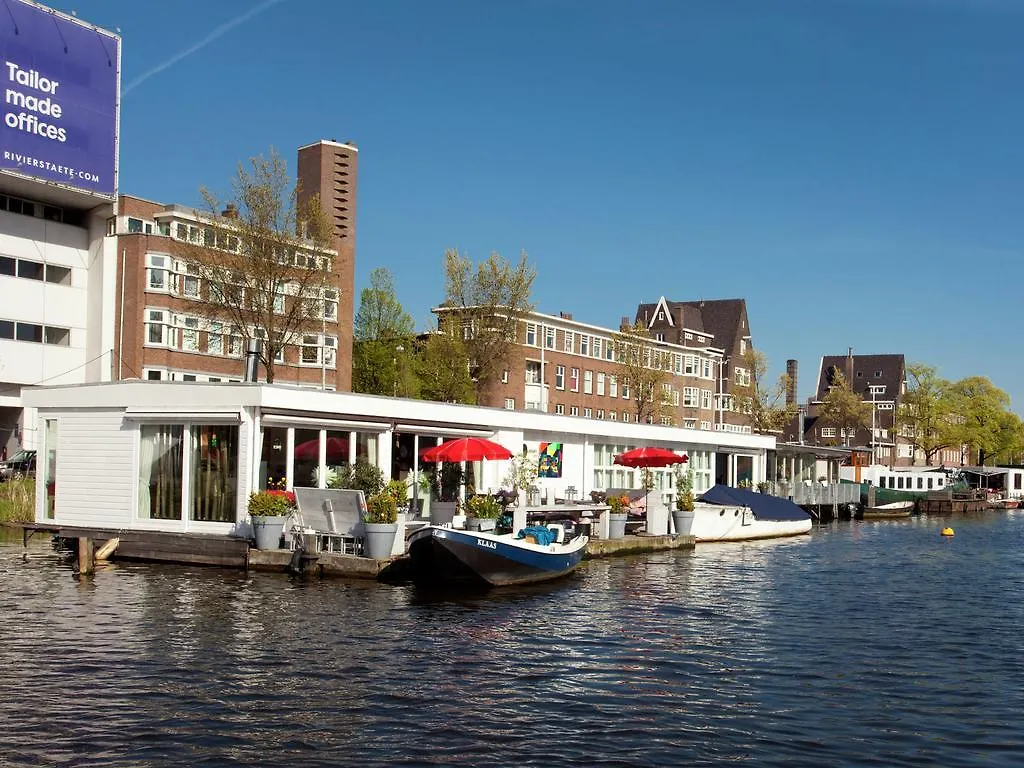 Modern Houseboat Apartment In Amsterdam With Terrace